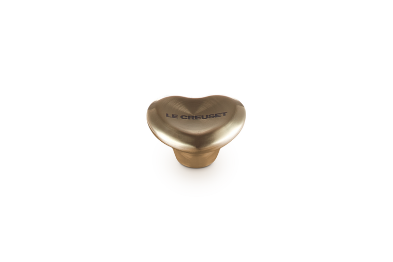 Le Creuset Hellgoldfarbener Herzknopf